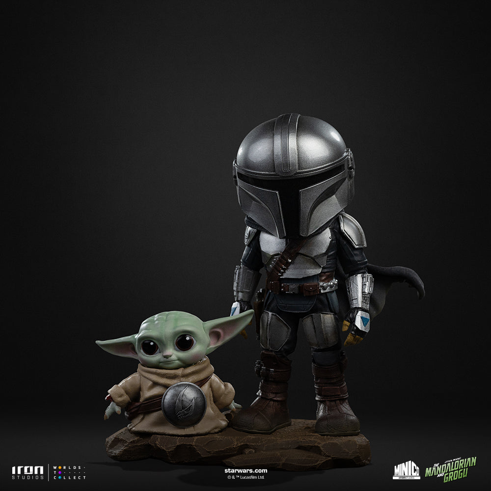 Armoured Bounty Hunter and Small Green Alien Mini Collectible Statue