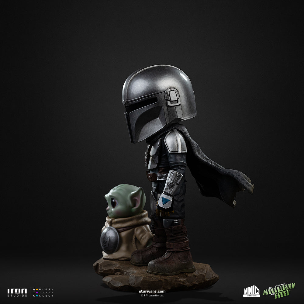 Armoured Bounty Hunter and Small Green Alien Mini Collectible Statue