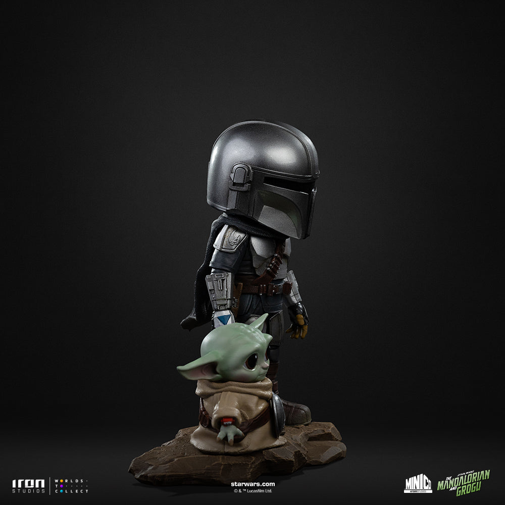 Armoured Bounty Hunter and Small Green Alien Mini Collectible Statue